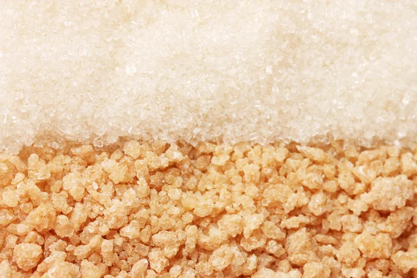 Witte suiker en bruine suiker achtergrond close-up — Stockfoto