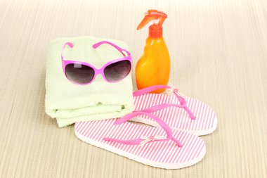 Beach accessories on mat