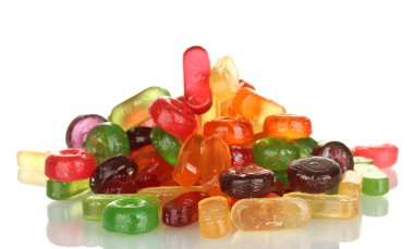 Tasty colorful candies on white background close-up clipart