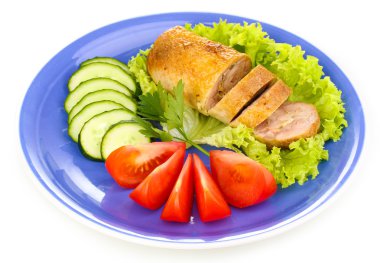 Tasty meat cutlet with garnish on plate isolated on white