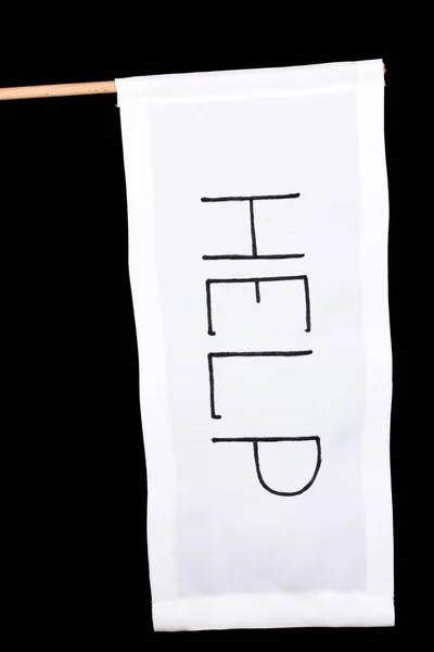 Ajuda escrita em pano branco isolado em preto — Fotografia de Stock