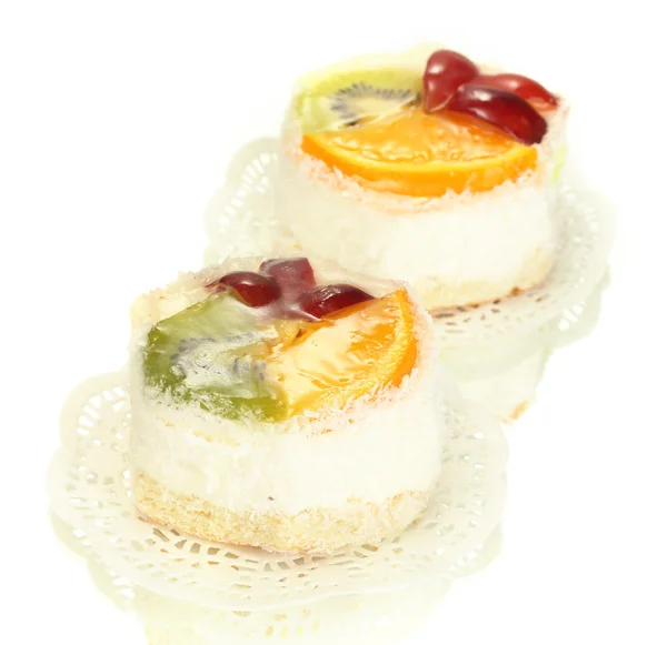Sweet cakes with fruits isolated on white — Stock Photo, Image