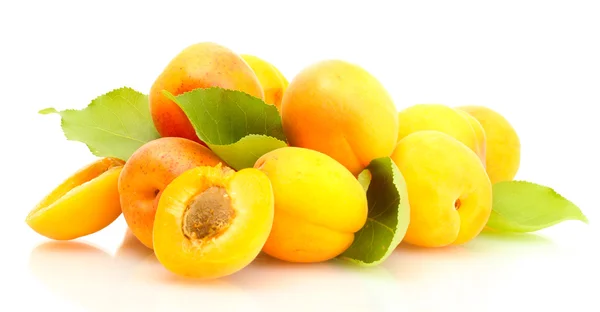Ripe apricots with green leaves isolated on white — Stock Photo, Image