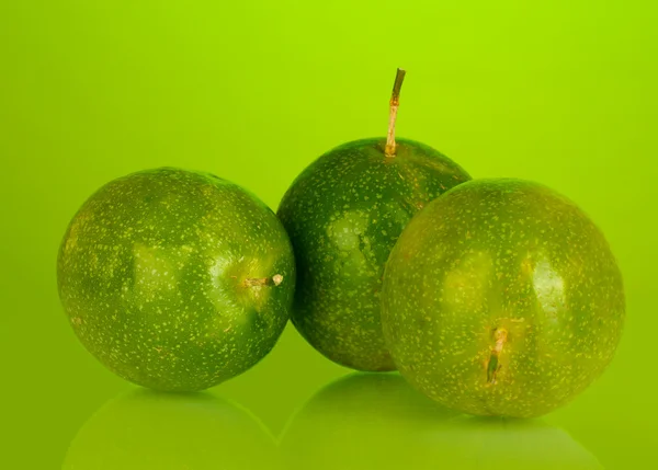 Green passion fruit on green background close-up — Stock Photo, Image