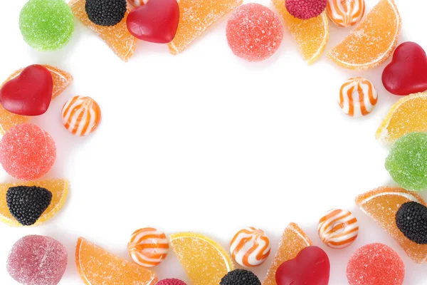 Ramme av fargerike gele søtsaker isolert på hvitt – stockfoto