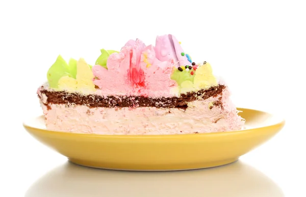 Creamy cake on saucer isolated on white — Stock Photo, Image