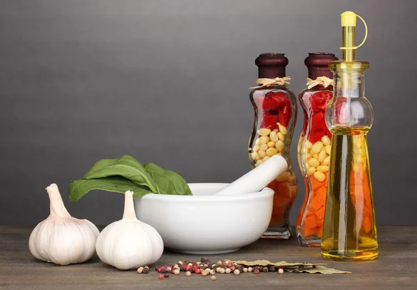 Set of ingredients and spice for cooking on wooden table on grey background — Stock Photo, Image