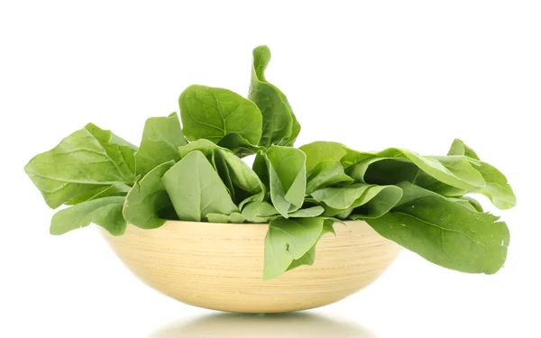 Fresh spinach in wooden bowl isolated on white — Stock Photo, Image