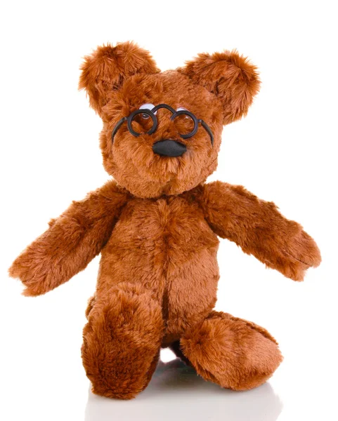 Сидящая игрушка медведя изолирована на белом Лицензионные Стоковые Фото