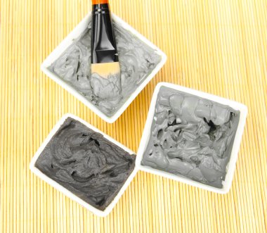 spa uygulamaları üzerinde hasır arka plan yakın çekim için kozmetik kil