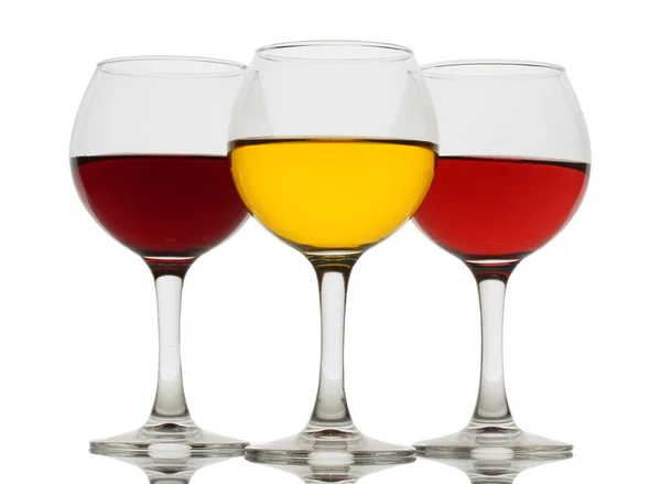 Três copos de vinho isolado em branco — Fotografia de Stock