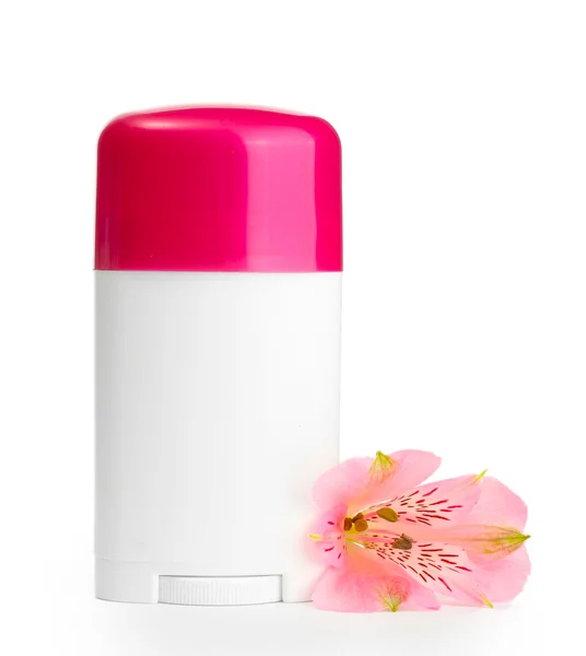 Çiçek üzerinde beyaz izole deodorant — Stok fotoğraf