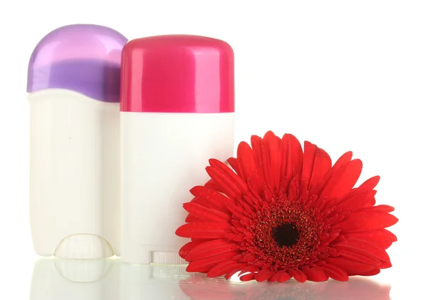 Desodorizantes com flor isolada em branco — Fotografia de Stock