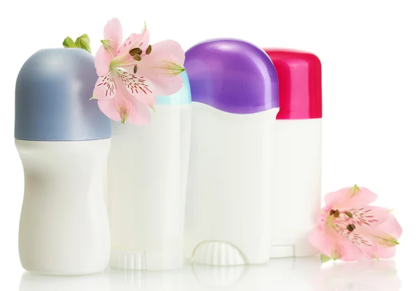 Deodorants with flowers isolated on white — Stock Photo, Image