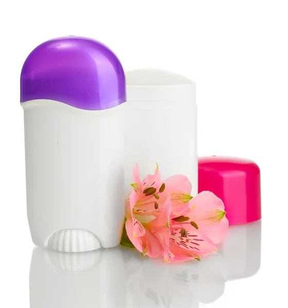 Deodoranty s květinami izolovaných na bílém — Stock fotografie