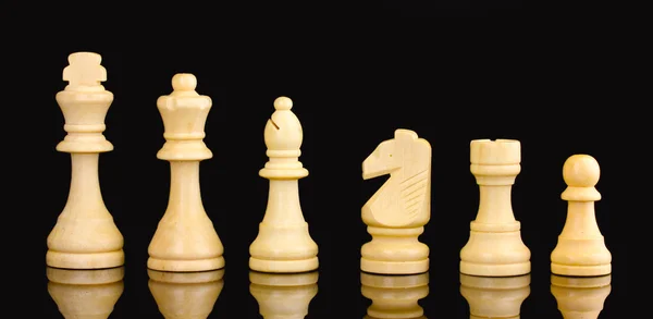 Pezzi di scacchi isolati su nero — Foto Stock
