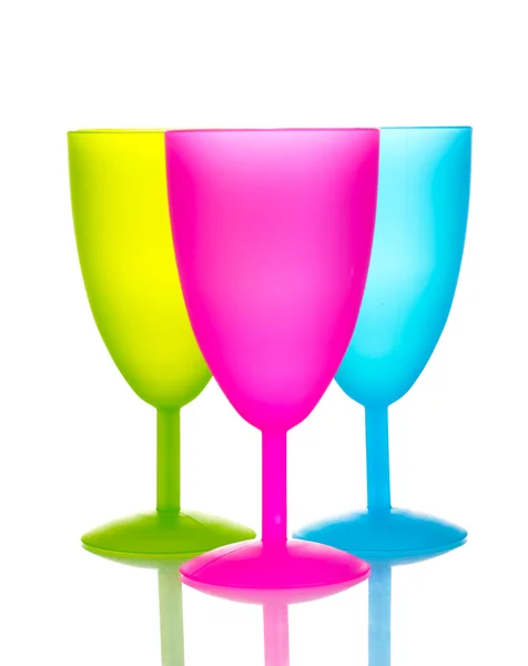Bright plastic goblets isolated on white — Stock Photo, Image