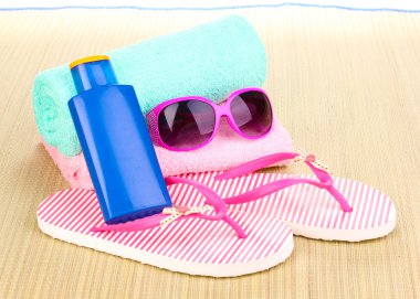 Beach accessories on mat