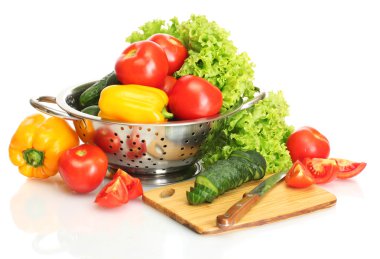 Fresh vegetables and knife on cutting board isolated on white clipart