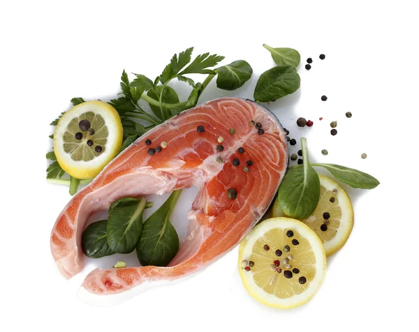 Red fish with lemon, parsley and pepper isolated on white — Stock Photo, Image