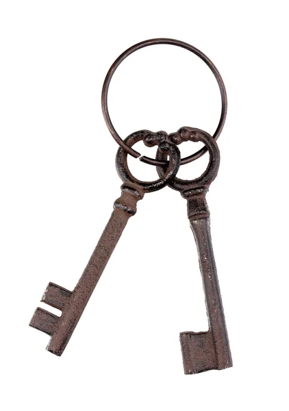 Куча старинных ключей, изолированных на белом — стоковое фото