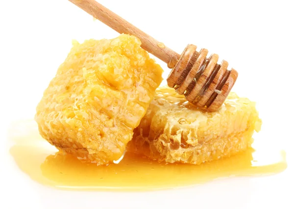 Golden honeycombs and wooden drizzler with honey isolated on white — Stock Photo, Image