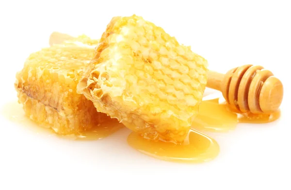 金黄的蜂窝和蜂蜜隔离在白色木制 drizzler — 图库照片