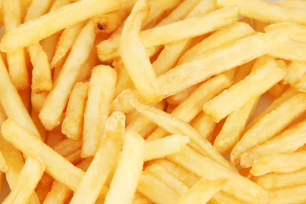 Aardappelen frietjes achtergrond — Stockfoto