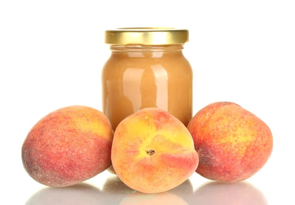 Jar with peach baby food isolated on white — Stock Photo, Image