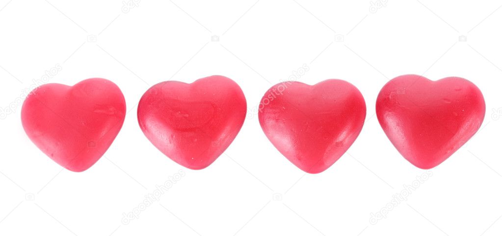 Red candy hearts isolated on white