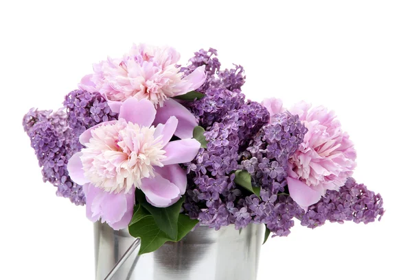Beautiful lilac and peonies flowers in metal bucket isolated on white — Stock Photo, Image