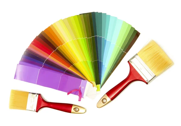 Světlé palety barev izolovaných na bílém a štětce — Stock fotografie