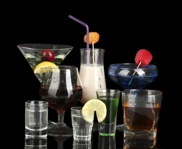 A variety of alcoholic drinks isolated on black — Stock Photo, Image