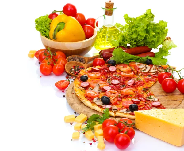Delicious pizza, vegetables and salami isolated on white — Stock Photo, Image