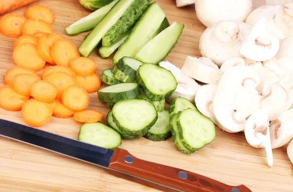 Food ingredients on chopping board — Stock Photo, Image
