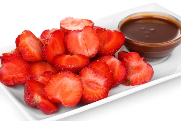 Fresh strawberries on plate with chocolate close-up — Stock Photo, Image