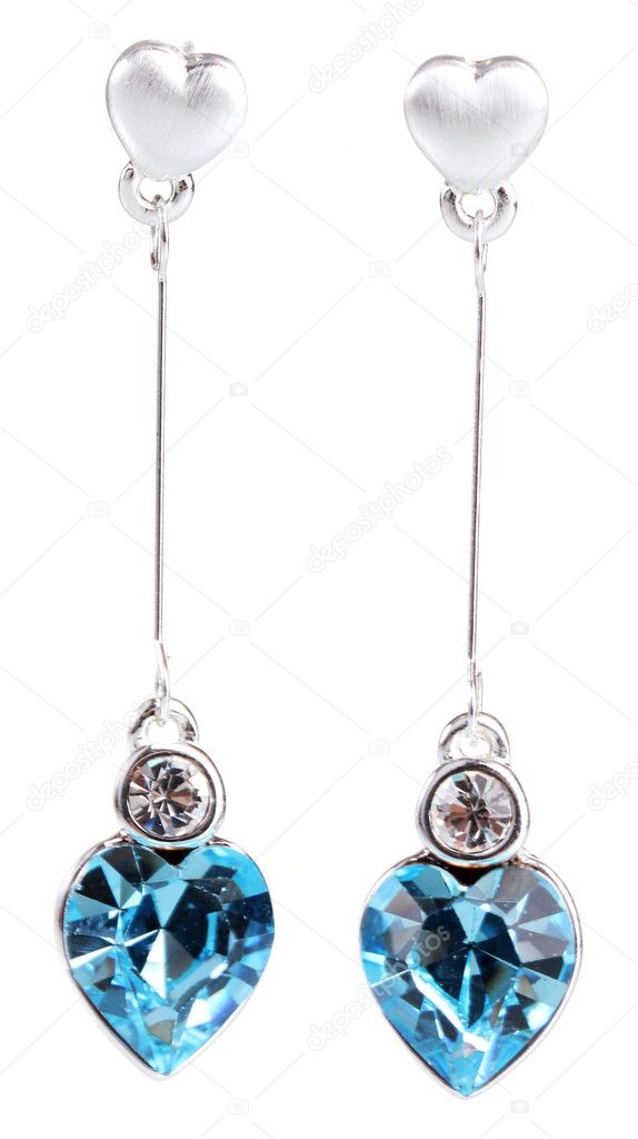 Beautiful silver earrings with precious stones isolated on white