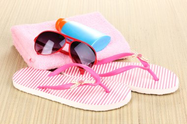 Beach accessories on mat