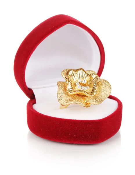 Gold ring with golden flower and clear crystals in red velvet box isolated on white — Stock Photo, Image