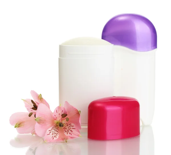 Desodorantes con flores aisladas en blanco — Foto de Stock