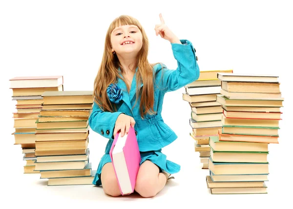 Bambina con un libro isolato su bianco — Foto Stock