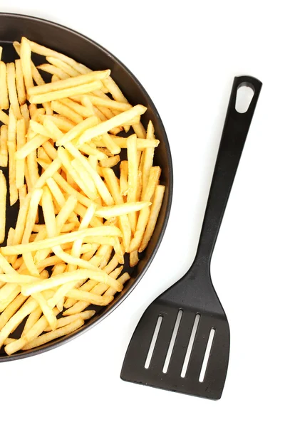 Aardappelen frietjes in de pan op witte achtergrond close-up — Stockfoto