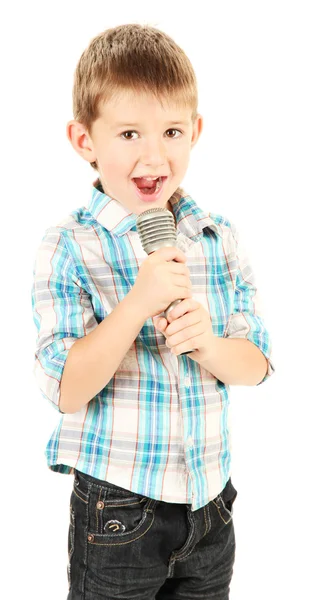 Niño divertido con micrófono, aislado en blanco — Foto de Stock