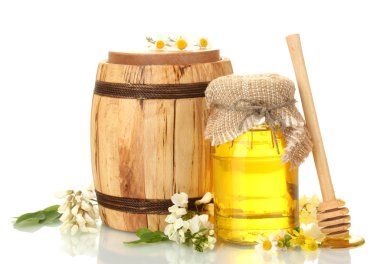 Sweet honey in barrel and jar with acacia flowers isolated on white clipart