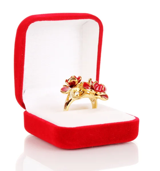 Gold ring with red flowers and clear crystals in red velvet box isolated on white — Stock Photo, Image