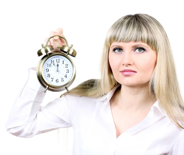 Young business woman holding clock isolated on white — Stock Photo, Image