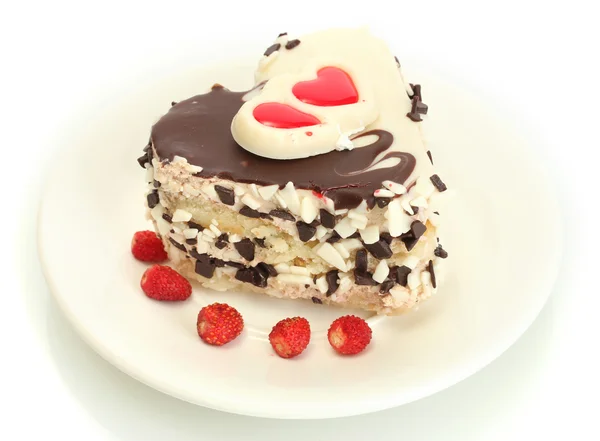 Солодкий торт з шоколадом на тарілці ізольований на білому — стокове фото