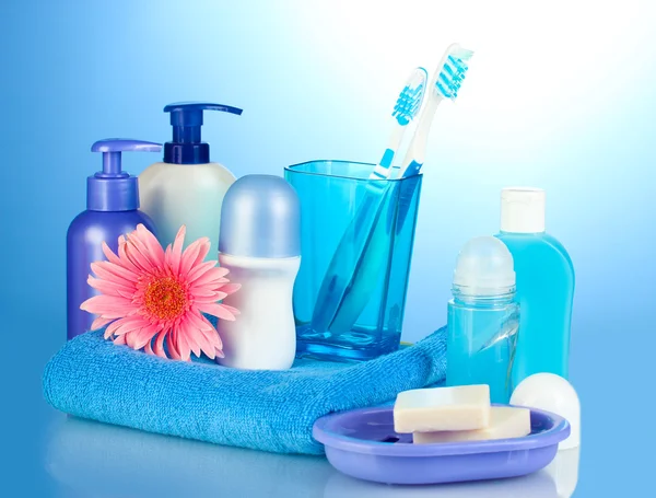 Bathroom setting on blue background — Stock Photo, Image