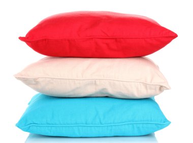 Bright color pillows isolated on white