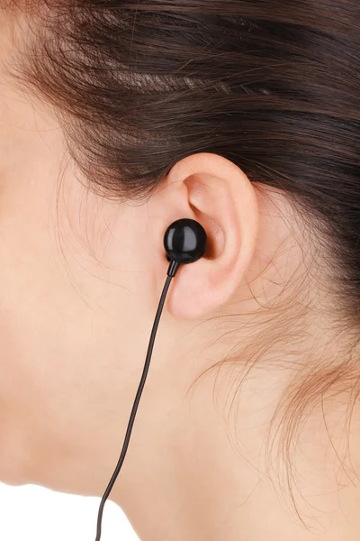 Orelha humana com fone de ouvido close-up — Fotografia de Stock